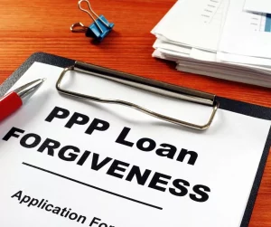 PPP Loan Forgiveness on a clipboard