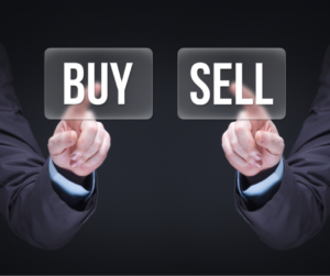 Hands pointing to Buy-Sell signs.