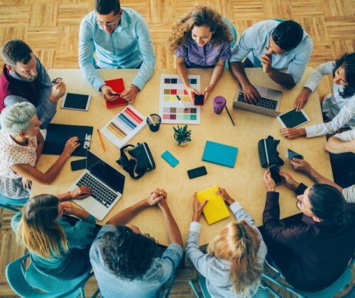 Board members meeting around a table.